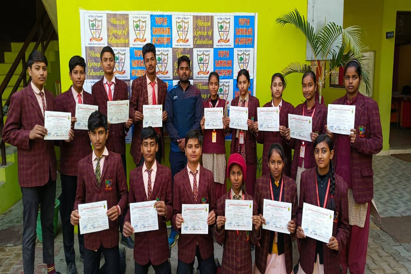 Students with sports achievement certificates